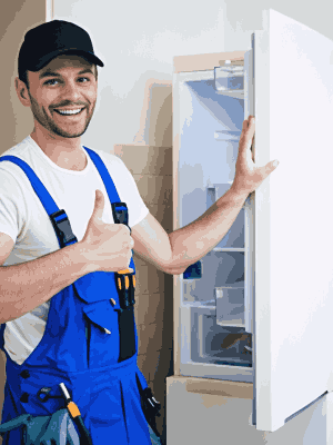 Repairman fixing a refrigerator and showing thumbs up after successful repair